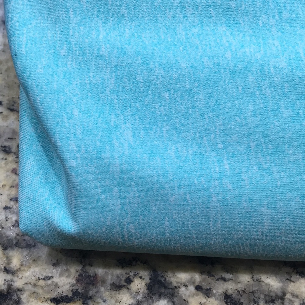 Turquoise and white stretch fabric